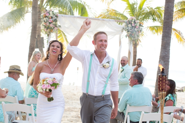 Wedding-couple-walking-down-aisle