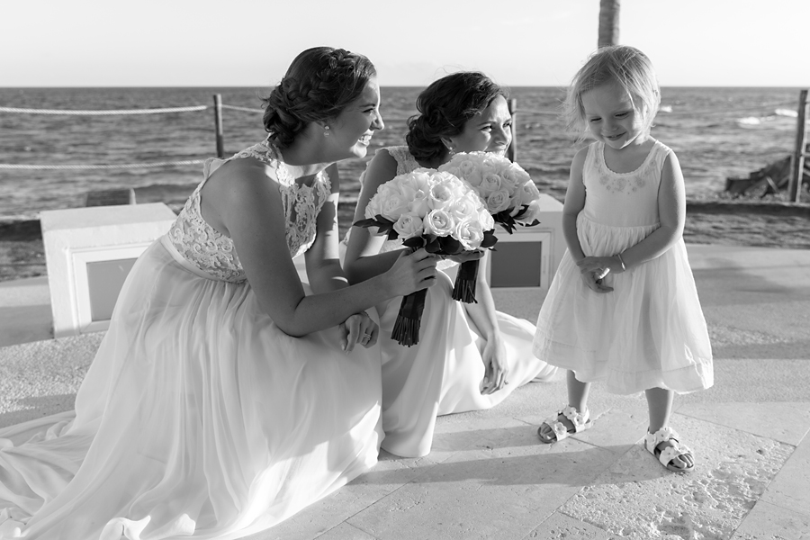 Two brides with flowergirl